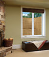 An egress window well installed within a finished basement space in Newton.