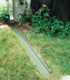 A recessed gutter drain extension installed in Mount Pocono, New Jersey and Pennsylvania