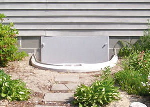 Rigid plastic crawl space access well installed in a Sparta crawl space