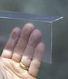 Closeup of a clear plastic covering on a Lehman crawl space block wall