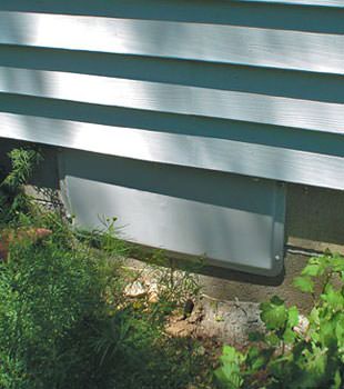 A gray crawl space vent cover in Arlington Heights
